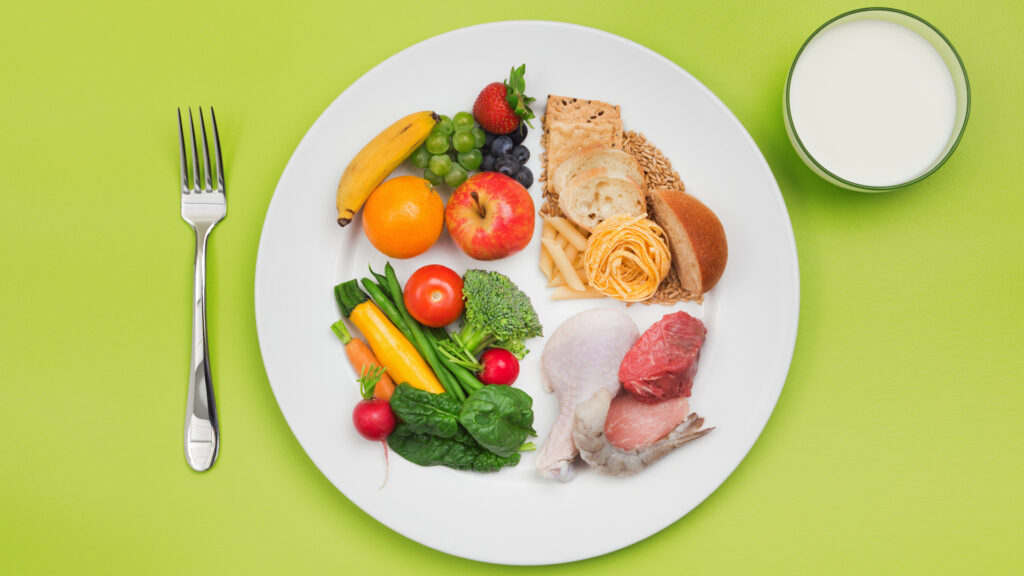 a plate of different fruits