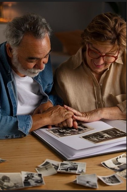 an old couple reading magazine together