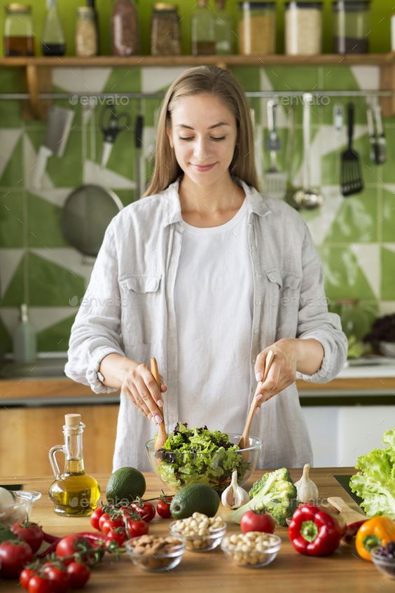 a lady preparing vegetables