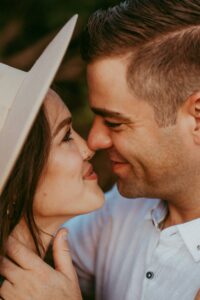 Romantic young couple embracing and touching noses