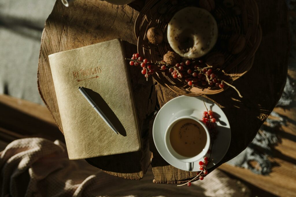 Close-Up Shot of a Cup of Tea beside a Fruit