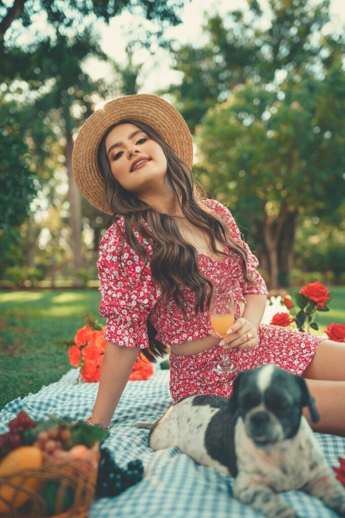 Woman with Dog on Picnic Blanket