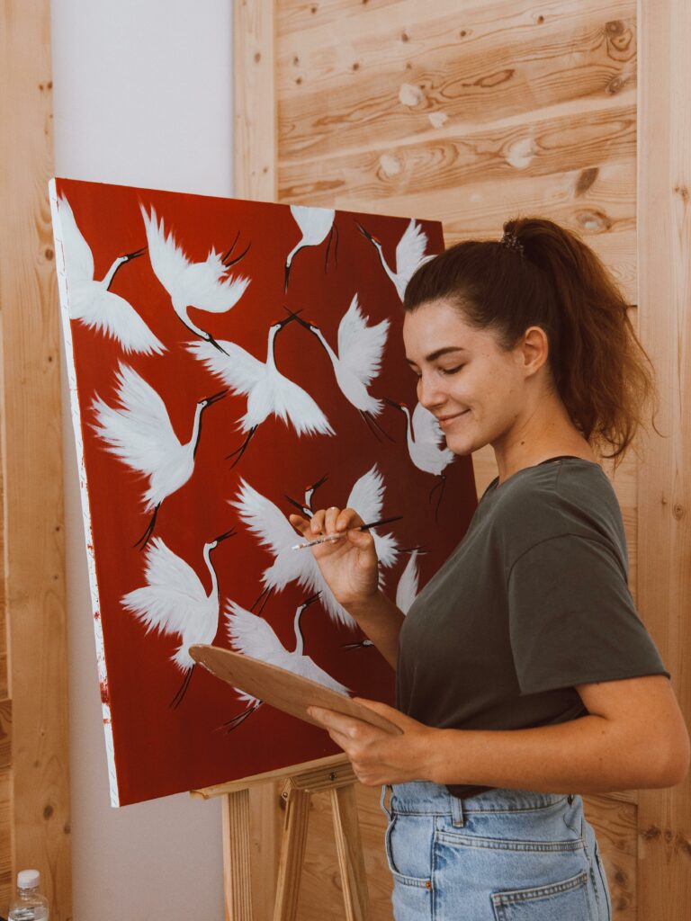 A Woman Painting on the Canvass