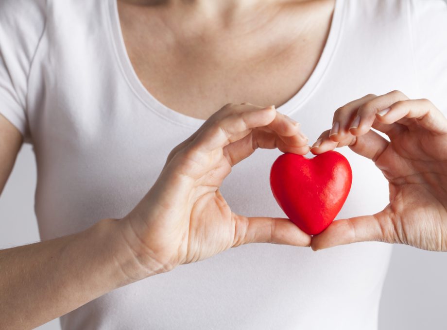 Female hands holding red heart, Love concept for valentines day with sweet and romantic moment